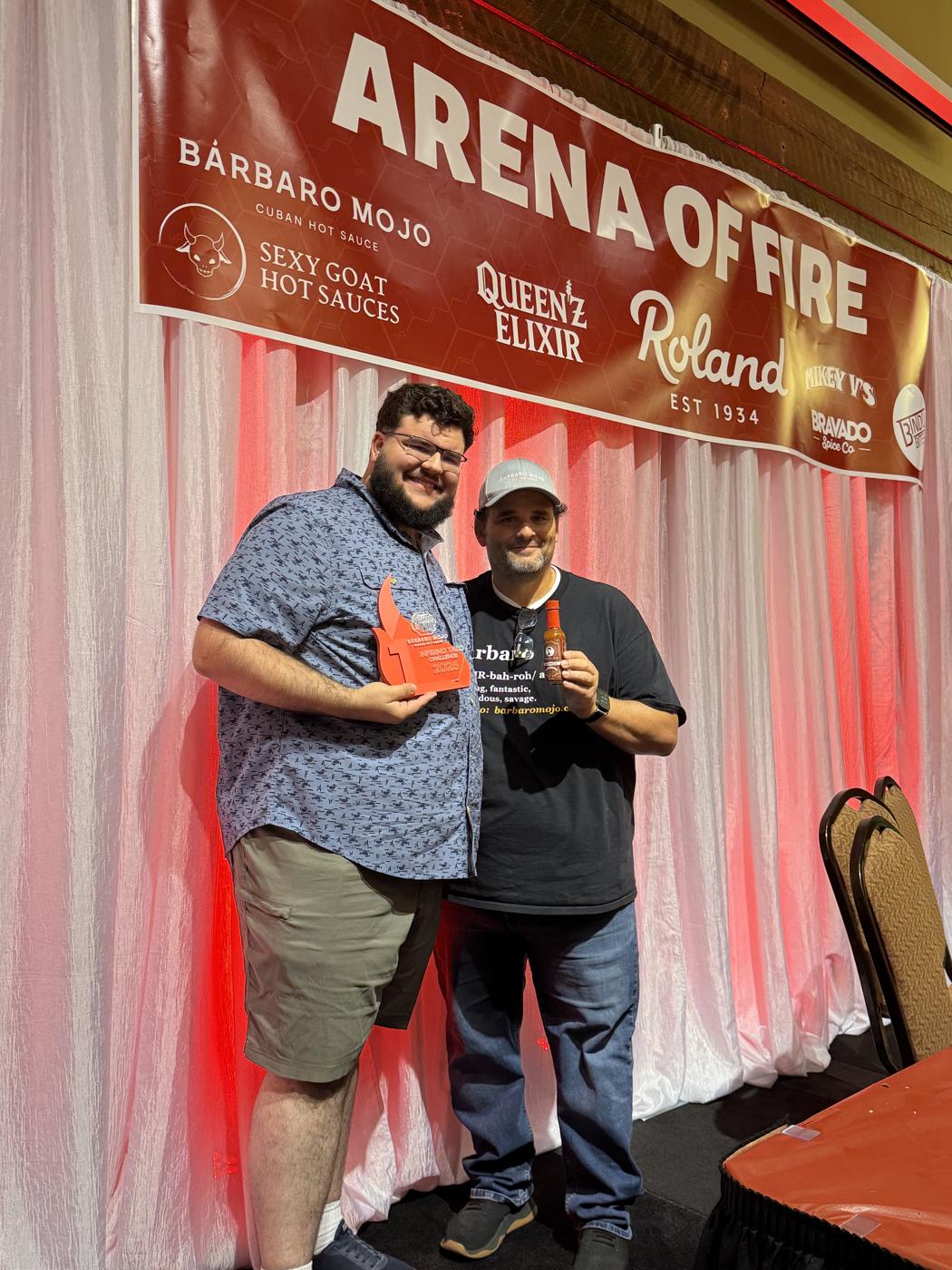 Jason Fivush, 1st place winner of the Inferno Taco Challenge 2026, holding his trophy